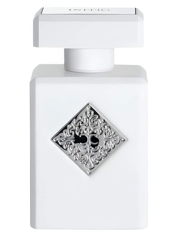 Initio Parfums Prives Rehab perfume bottle – blurred decorative background