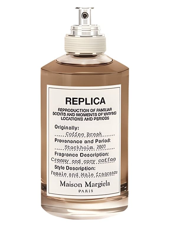 Maison Margiela Coffee Break perfume bottle – blurred decorative background