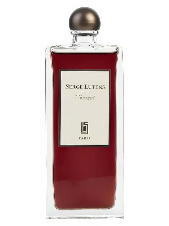 Serge Lutens Chergui perfume bottle – blurred decorative background