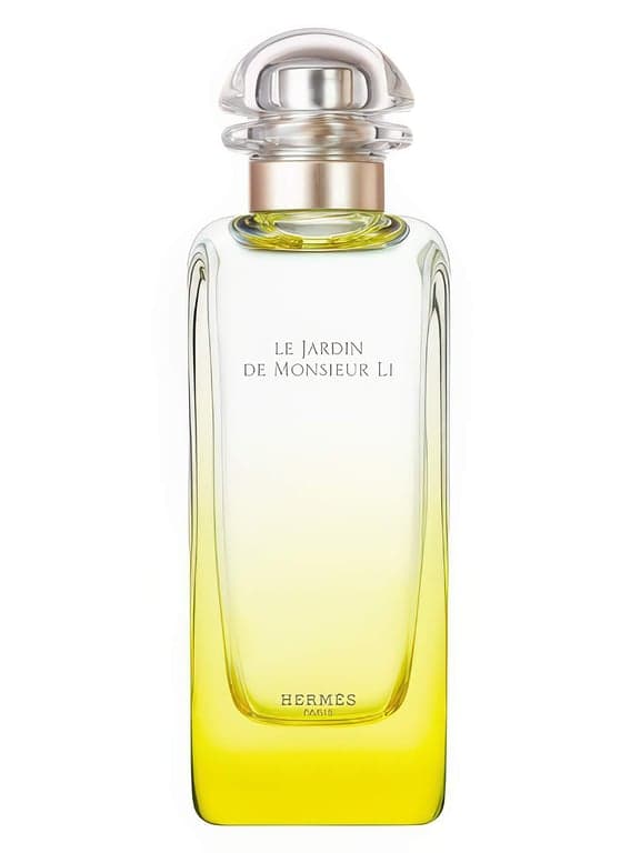 Hermès Le Jardin de Monsieur Li perfume bottle – blurred decorative background