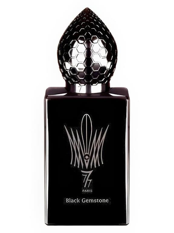 Stephane Humbert Lucas 777 Black Gemstone perfume bottle – blurred decorative background