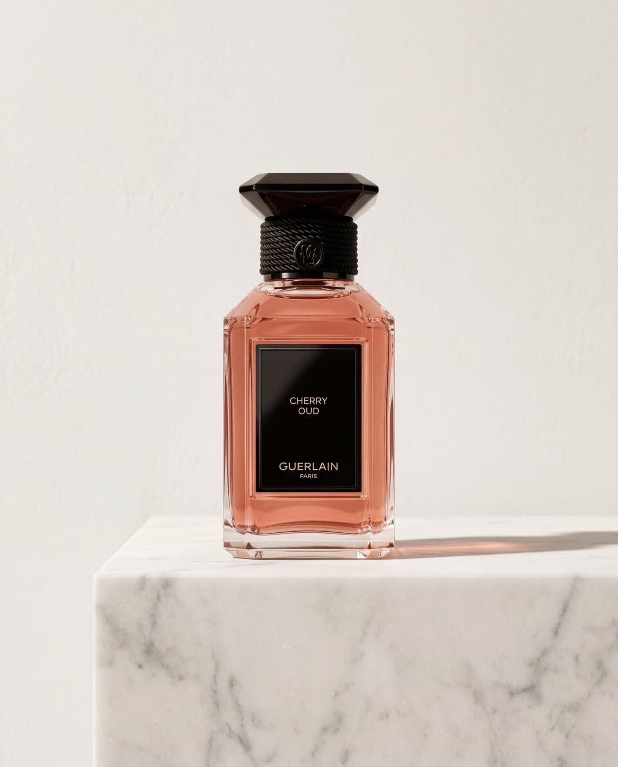 Cherry Oud by Guerlain - Marble Product Shot January 2026 Fragrance