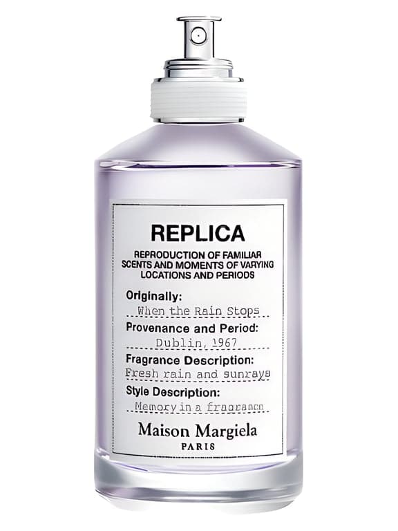 Maison Margiela When the Rain Stops perfume bottle – blurred decorative background