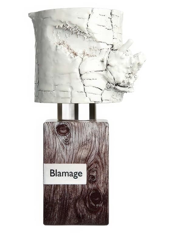 Nasomatto Blamage perfume bottle – blurred decorative background