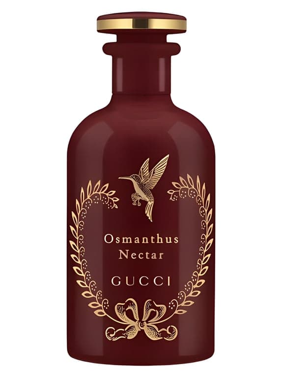 Gucci Osmanthus Nectar perfume bottle – blurred decorative background
