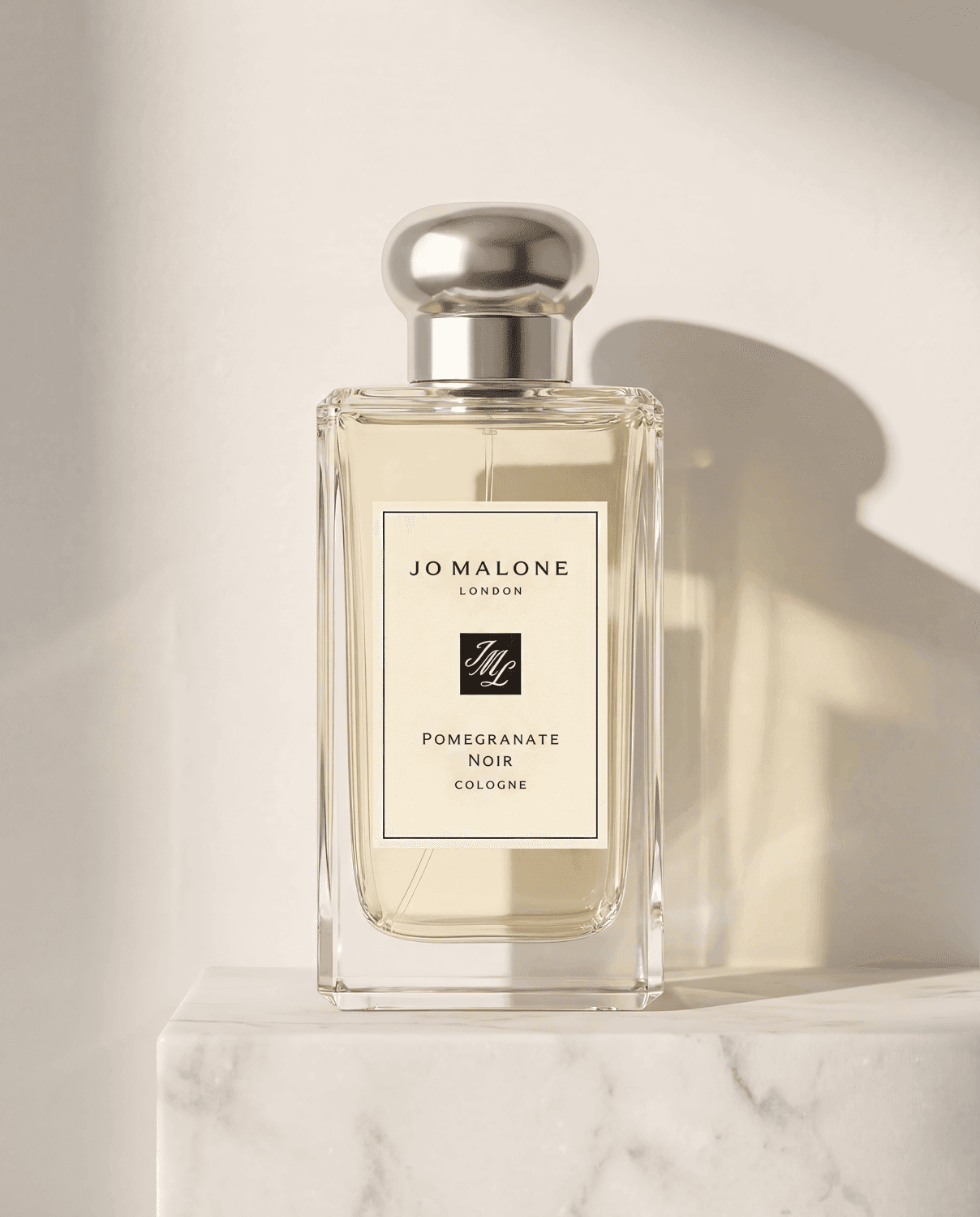 Pomegranate Noir by Jo Malone London - Marble Product Shot January 2026 Fragrance