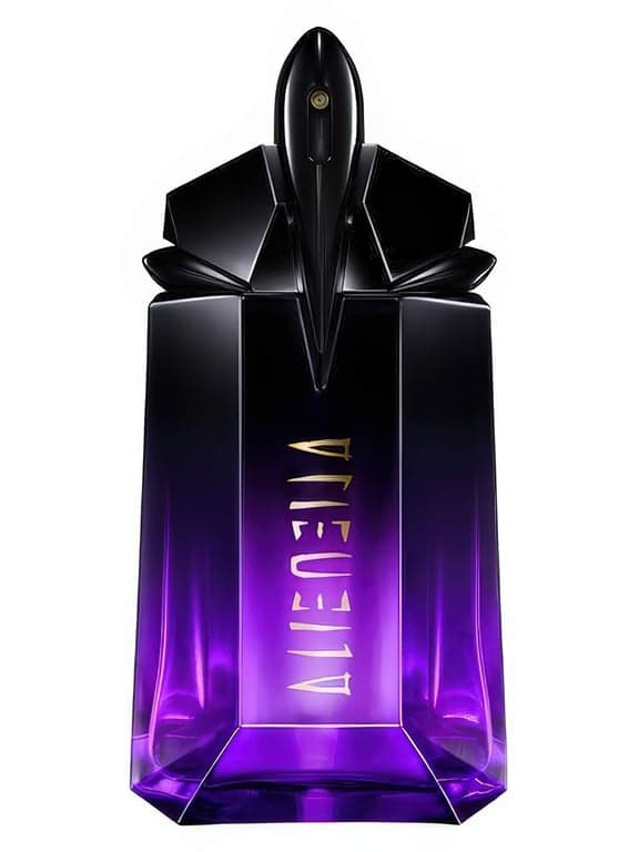 Mugler Alien Extraintense perfume bottle – blurred decorative background