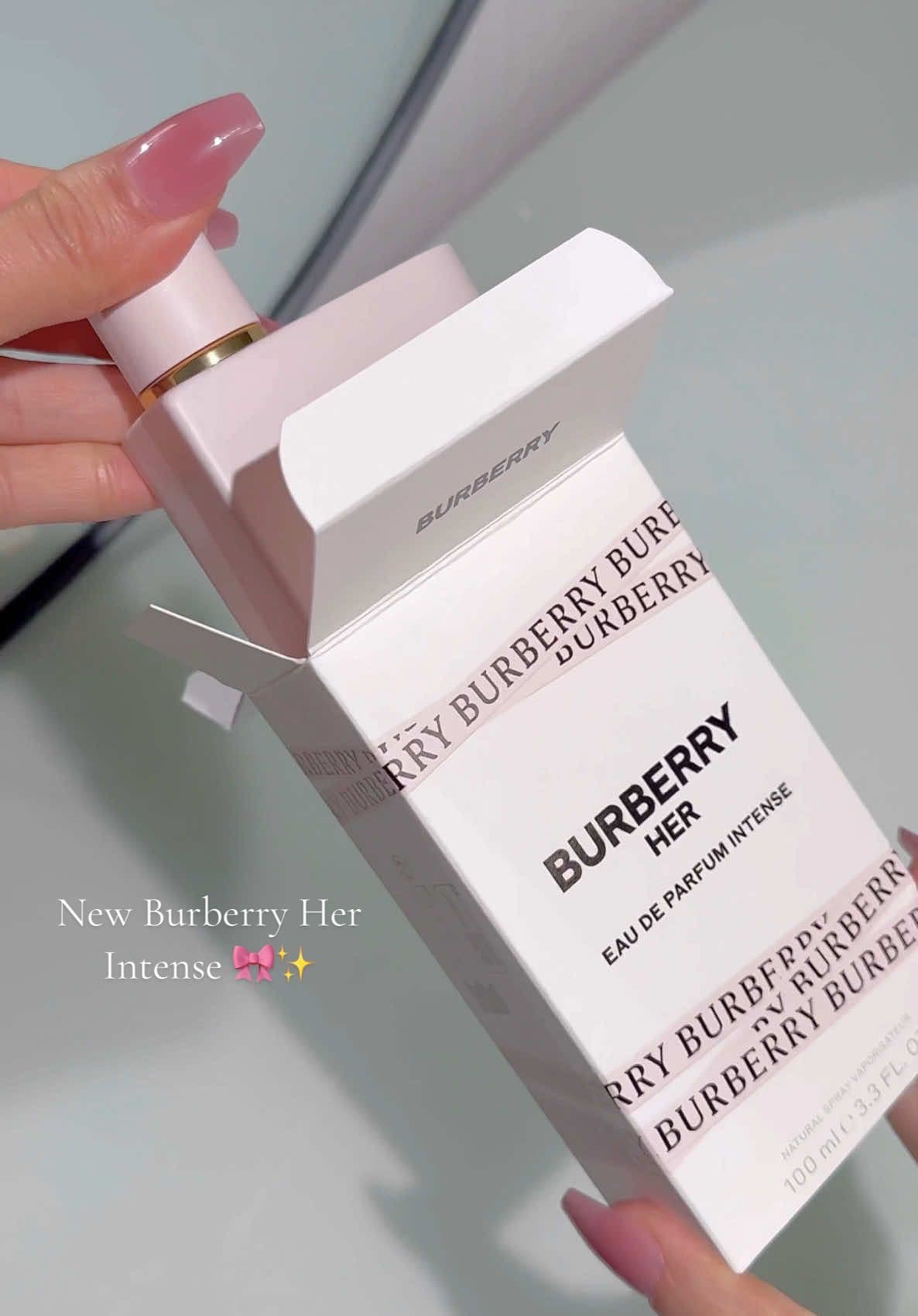 Bold, radiant, and irresistibly intense 🎀✨  @Burberry Her Intense Eau de Parfum envelops you in luscious wild strawberry, delicate orange blossom, and warm ambery wood. A powerful scent for a confident, modern woman. 🎀✨ #BurberryHerIntense #perfumeasmr #asmr #pinkperfume #woodyperfume #muskyperfume #sweetperfum #citrusperfume #perfumetok #newperfume 